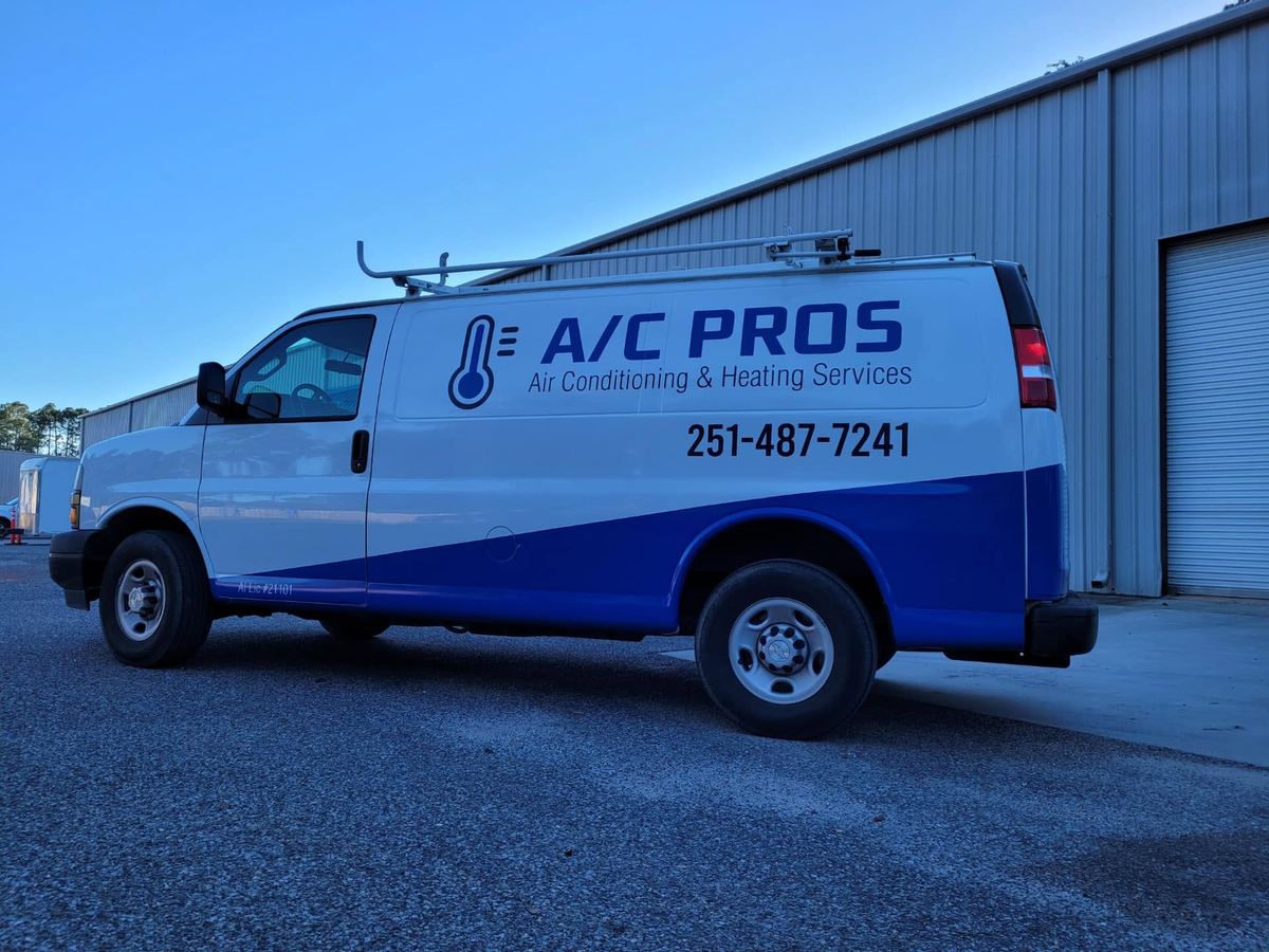 An A/C PROS service van at the shop in Fairhope, Alabama